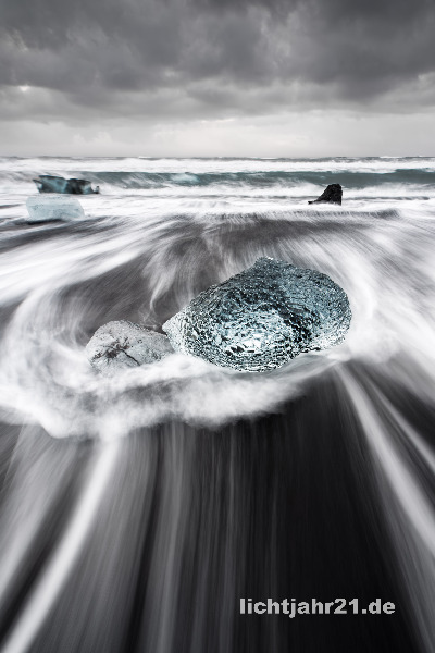 Big block of ice in the surf
